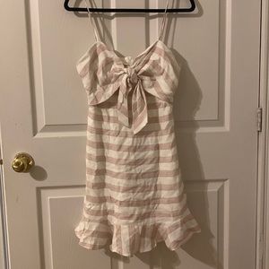 From sweetpea boutique in Halifax, fits more like a medium, tags still on.